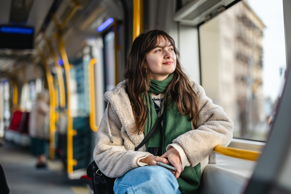 Woman On Bus Looking Out.Split Block 960X640